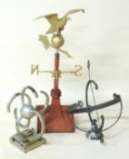 INTERESTING PRESSED METAL EAGLE FORM WEATHER VANE, 19th century, later mounted on a compass point
