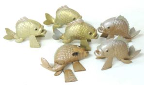 SIX DECORATIVE CAST IRON FISH FORM WATERSPOUTS, 31 (h) x 41cms (l) Provenance: The collection of