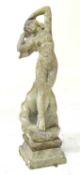WEATHERED RECONSTITUTED STONE GARDEN FIGURE OF VENUS, on a square plinth, 125cms (h) Provenance: The