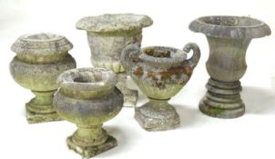 TWO CARVED WHITE MARBLE URNS, 39 and 31cms (h); together with thee reconstituted stone garden