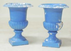 PAIR OF PAINTED CAST IRON CAMPAGNA GARDEN URNS, 67 (h) x 49cms (diam.) Provenance: The collection of