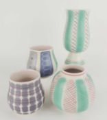 FOUR POOLE POTTERY CONTEMPORARY VASES, comprising PKT (703), 19.5cms (h); PKT (185), 12cms (h);