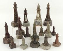 CORNISH SERPENTINE SOUVENIR LIGHTHOUSE ORNAMENTS including two thermometers, 20cms (h) the