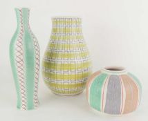 THREE POOLE POTTERY CONTEMPORARY VASES, comprising PGT, 11.5cms (h); PKT (693), 26.5cms (h); and PJL