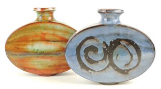 LLANGOLLEN POTTERY BLUE GLAZED OVAL FLASK, 20.5cms (h); together with a Llangollen pottery streaky