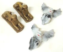 PAIR OF DECORATIVE RECONSTITUTED STONE LINCOLN IMP WALL ORNAMENTS, 33cms (h); together with a pair