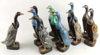 A FLOCK OF ELEVEN 'DANDY DUCK' CLOTHES BRUSHES, each 30cms (h) Provenance: The collection of