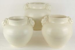 THREE POOLE MAGNOLIA WHITE BALUSTER VASES (659), 27cms (h) (3) Provenance: The collection of