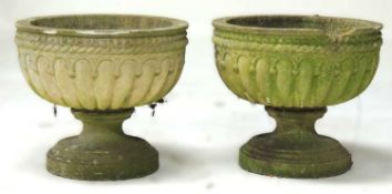 PAIR OF WEATHERED RECONSTITUTED STONE SHALLOW GRECIAN STYLE GARDEN URNS, 66 (h) x 54cms (diam.)