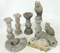 PAIR OF RECONSTITUTED STONE LIONS, 43cms (h); reconstituted stone ammonite, 45cms (h); owl, 40cms (