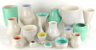 COLLECTION OF POOLE POTTERY VASES, finished in shagreen, pastel pink, and mushroom and sepia glazes,