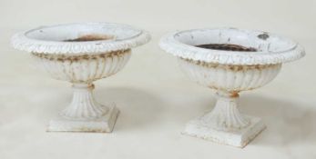 PAIR OF PAINTED CAST IRON GARDEN SHALLOW URNS, 37 (h) x 55cms (diam.) Provenance: The collection