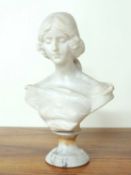 MANNER OF CIPRIANI: CARVED ALABASTER BUST OF A YOUNG LADY, 20th century, 47cms (h) Provenance: The