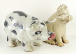 GLAZED TERRACOTTA 'GLOUCESTER OLD SPOT' PIG, 41cms (l); together with a cream glazed pig seated on