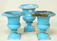 PAIR OF PAINTED CAST IRON GARDEN PEDESTAL URNS, 46 (h) x 47cms (diam.); together with a Victorian