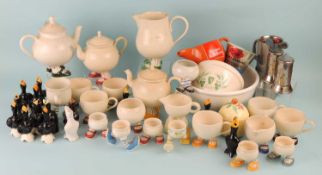 COLLECTION OF NOVELTY POTTERY FOOTED TEAPOTS, CUPS & JUGS, including Carlton Ware egg cups, a number
