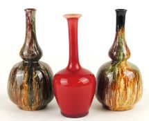 LINTHORPE MINIATURE SANG DE BOEUF GLAZED BOTTLE VASE, numbered 815, 13.5cms (h); together with two