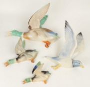 SET OF POOLE POTTERY FLYING DUCK WALL ORNAMENTS, largest 29cms; together with a Poole Pottery