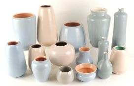 COLLECTION OF POOLE POTTERY VASES, finished in grey, blue, and mushroom and sepia, tallest 27cms (