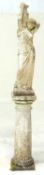 WEATHERED RECONSTITUTED STONE GARDEN FOUNTAIN FIGURE OF A GRECIAN WATER CARRIER, 92cms (h),