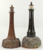 CORNISH BROWN SERPENTINE SOUVENIR LIGHTHOUSE, 39cms (h), another in black serpentine, 42cms (h) (