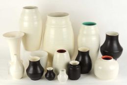 LARGE POOLE MAGNOLIA WHITE BALUSTER VASE (661), 33cms (h); a pair of magnolia white vases (856),