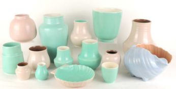 COLLECTION OF POOLE PASTEL SHADED POTTERY VASES, including whelk shell vase, 20cms (h); and
