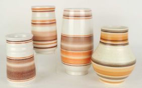 FOUR POOLE PICOTEE POTTERY BROWN BANDED VASES, tallest 23.5cms (h) Provenance: The collection of