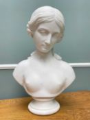 VICTORIAN STYLE CARVED MARBLE BUST of a maiden, hair tied in bun with loose tresses to neck, on