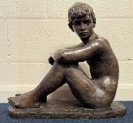 ‡ KARIN JONZEN RBA (British, 1914-1998) bronze resin sculpture - seated boy, signed to base,