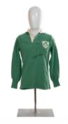 RUGBY UNION CLUB HOUSE: WILLIE JOHN MCBRIDE IRELAND REPLICA JERSEY, signed across jersey, shield