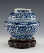 CHINESE BLUE & WHITE PORCELAIN JAR, painted all over with densely scrolling lotus and peonies,