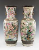 PAIR CHINESE CRACKLEWARE VASES, painted in famille rose enamels with pairs of phoenix (fenghuang),