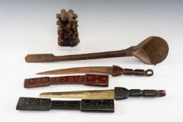 ETHNOGRAPHIC ITEMS: comprising Bali Barong wall mask, Swat valley ladle, Makonde figure group, and