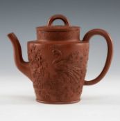 CHINESE YIXING TEAPOT & COVER, carved with peacock and peony, impressed dragon mark to base, 12.5cms