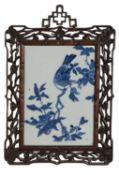 CHINESE BLUE & WHITE PORCELAIN PLAQUE, Qianlong, painted with a bird perched in flowering prunus