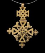 YELLOW METAL COPTIC CROSS STYLE PENDANT, Ethiopia, two section hinge design, 14.3g Provenance: