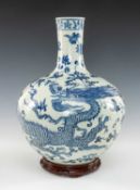 CHINESE BLUE & WHITE TIANQIUPING VASE, painted in the Ming-style with large single three-clawed