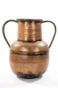 LARGE ARABIC COPPER WATER VESSEL, wide neck and loop handles above bulbous body, decorated all