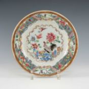 CHINESE FAMILLE ROSE PLATE, Yongzheng/Qianlong, painted with cockerel on a rock in an ornamental