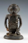 LUBA FEMALE FIGURE, D.R. Congo, kneeling with scars to abdomen and arm, beaded ornaments, bead inset