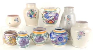 CARTER, STABLER & ADAMS FLORAL SPRIGS VASE, 16cms (h); two CSA Grapes small vases, 11cms (h); a