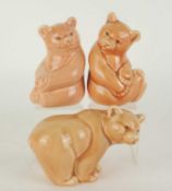 THREE POOLE POTTERY BEAR CUBS, each in a mushroom glaze, largest 12cms (h) Provenance: The