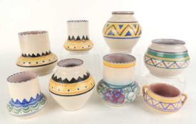 NUMBER OF CARTER, STABLER & ADAMS ART DECO MINIATURE VASES, the largest 11cms (h); and a small