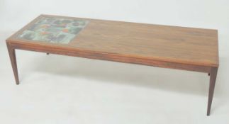 MID-CENTURY ROSEWOOD VENEERED TILE TOPPED LONG COFFEE TABLE, inset with lava type glazed tiles,