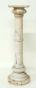 LATE VICTORIAN TURNED ALABASTER TORCHÈRE with a canted square top 27.5cms², 108cms (h) Provenance: