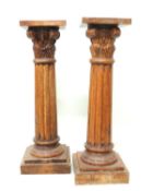 PAIR OF CARVED WOODEN COLUMN STANDS, 89cms (h), tops 25cms² Provenance: The collection of Philip