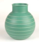KEITH MURRAY FOR WEDGWOOD: MATT GREEN INCISED GLOBULAR VASE, facsimile signature factory mark, 15.