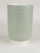 KEITH MURRAY FOR WEDGWOOD: CELADON GREEN SLIP WARE REEDED VASE, KM factory mark, 18.5cms (h)