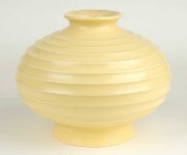 KEITH MURRAY FOR WEDGWOOD: UNUSUAL STRAW GLAZED FLUTED SQUAT GLOBULAR VASE, facsimile signature